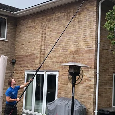a man cleaning house